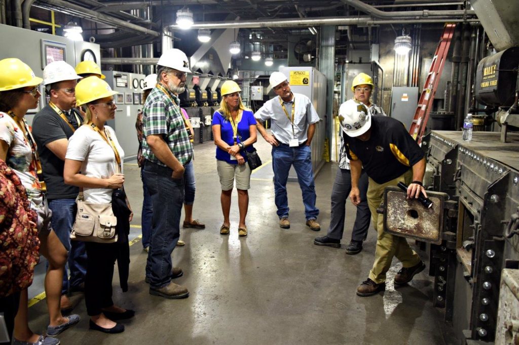 Teachers participating in the co-op sponsored education program tour the power plant at the University of Missouri in Columbia.
