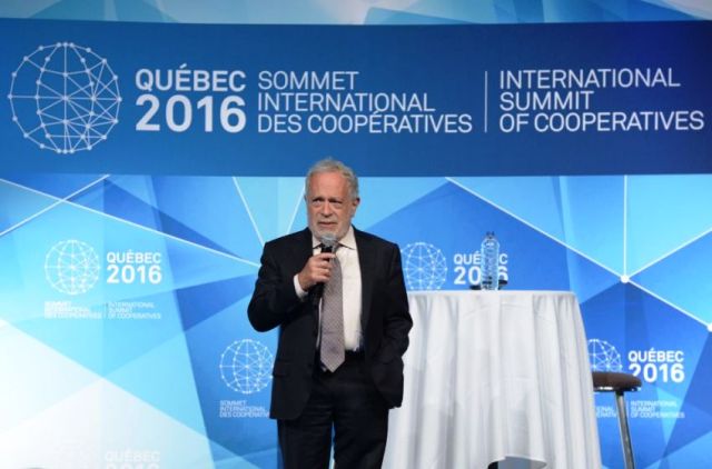 Former U.S. Labor Secretary Robert Reich tells global cooperative leaders that they have a critical mission to fulfill. (Photo By: Sommet International des Coopératives)