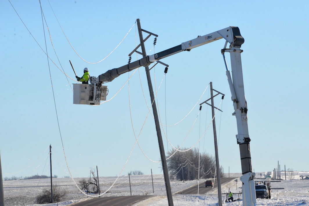 Crews from East River Electric Power Cooperative are repairing more than 500 transmission structures in northeastern South Dakota, Christmas week. (Photo By: EREPC)