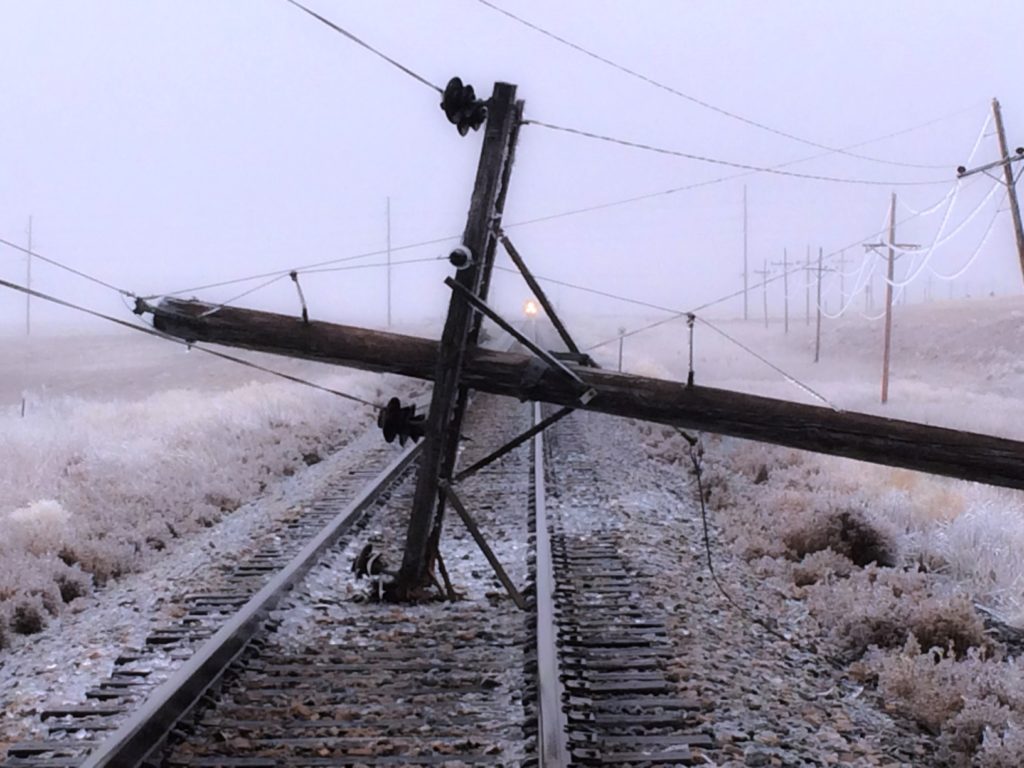 All in a day’s work: Victory Electric’s Heith Konecny helped stop a BNSF train from slamming into a power pole, documented ice storm damage and won a free lunch for his crew. (Photo By: Heith Konecny)