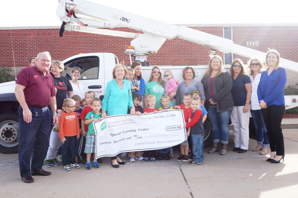 Special Learning Center and Central Electric Power Co-op celebrate a record fundraiser. (Photo By: Kim McKague)