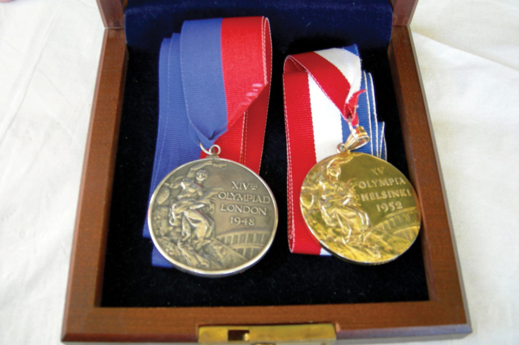 Havens' silver medal from the 1948 London and gold from the 1952 Helsinki Games in the solo 10,000-meter canoe race. (Photo Courtesy: Priscilla Knight)