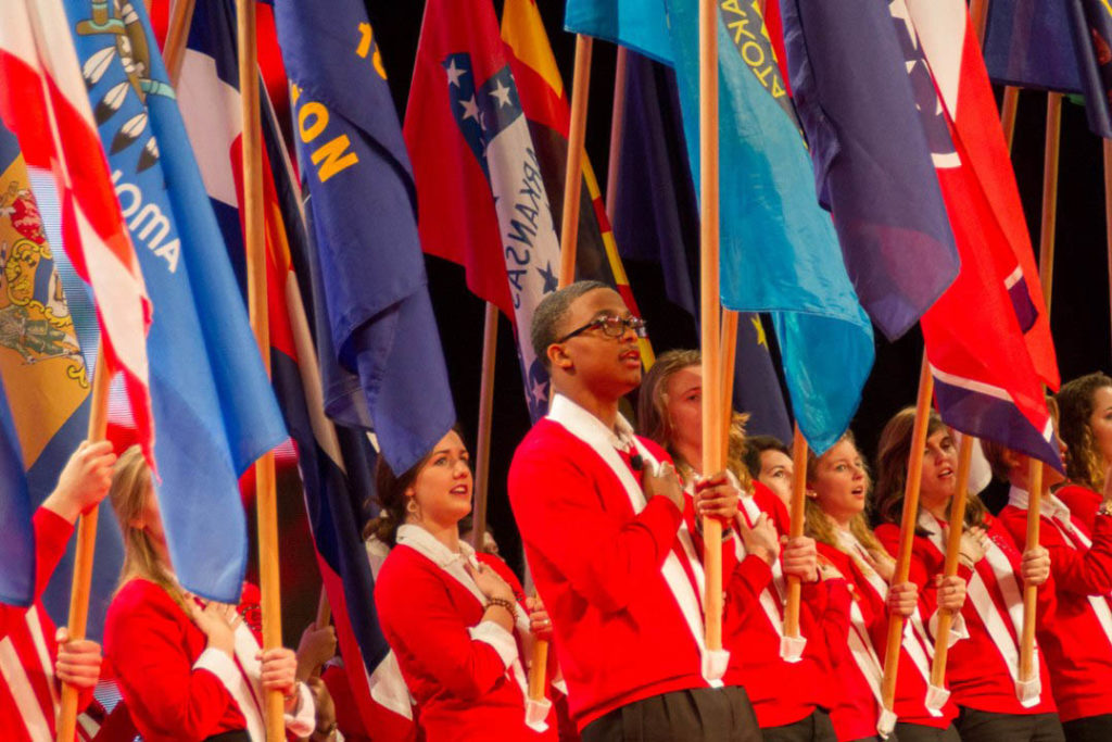Members of the Youth Leadership Council carry their respective state flags to the stage at the opening of the 75th NRECA Annual Meeting on Feb. 27 in San Diego. (Photo By: Luis Gomez Photos)