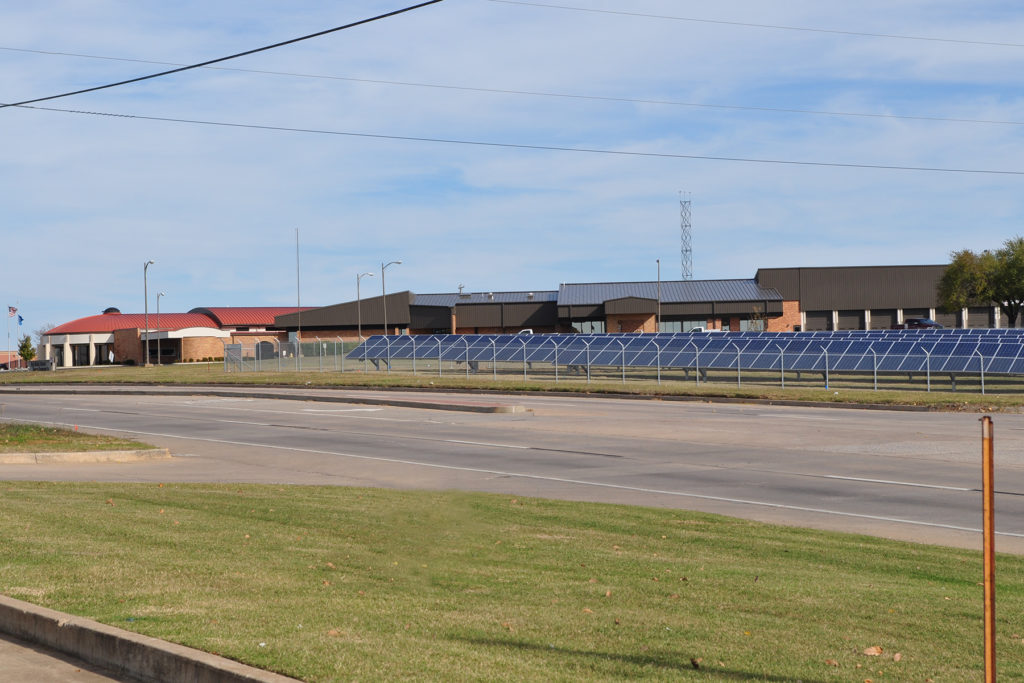 In Oklahoma’s ranch country, some property owners are subscribing to panels from a community solar project near East Central Oklahoma Electric Cooperative’s headquarters instead of building their own arrays. (Photo By: WFEC)