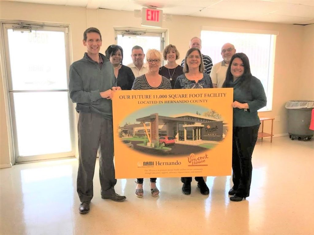 Withlacoochee’s David Lambert (third from left) with fellow supporters of efforts to bring Vincent Academy to the co-op’s service territory. (Photo By: NAMI Hernando)