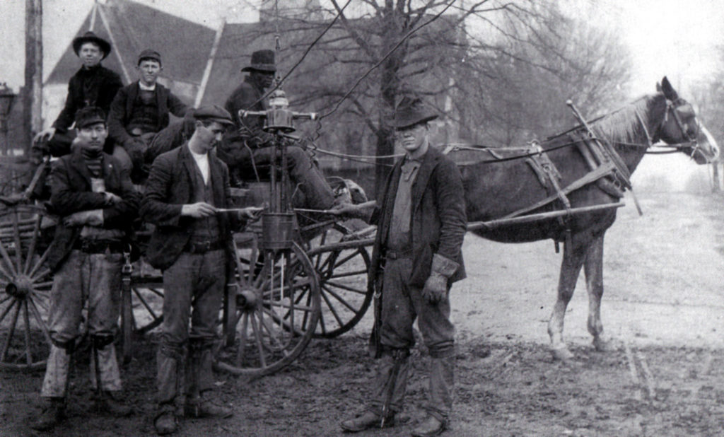 Line crew performing arc lamp maintenance in Huntsville, Alabama, in 1897. (Photo Courtesy of NLC Collection)