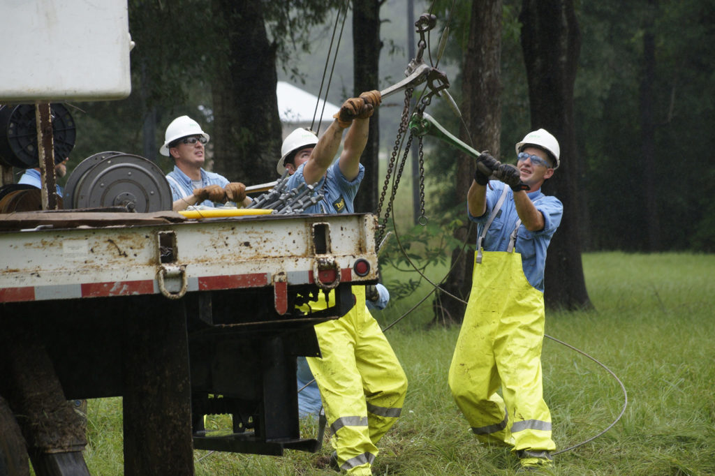 A co-op crew repairs power lines following Tropical Storm Harvey’s landfall Aug. 30 on the Louisiana coast. (Photo By: Danielle Tilley/ Beauregard EC)