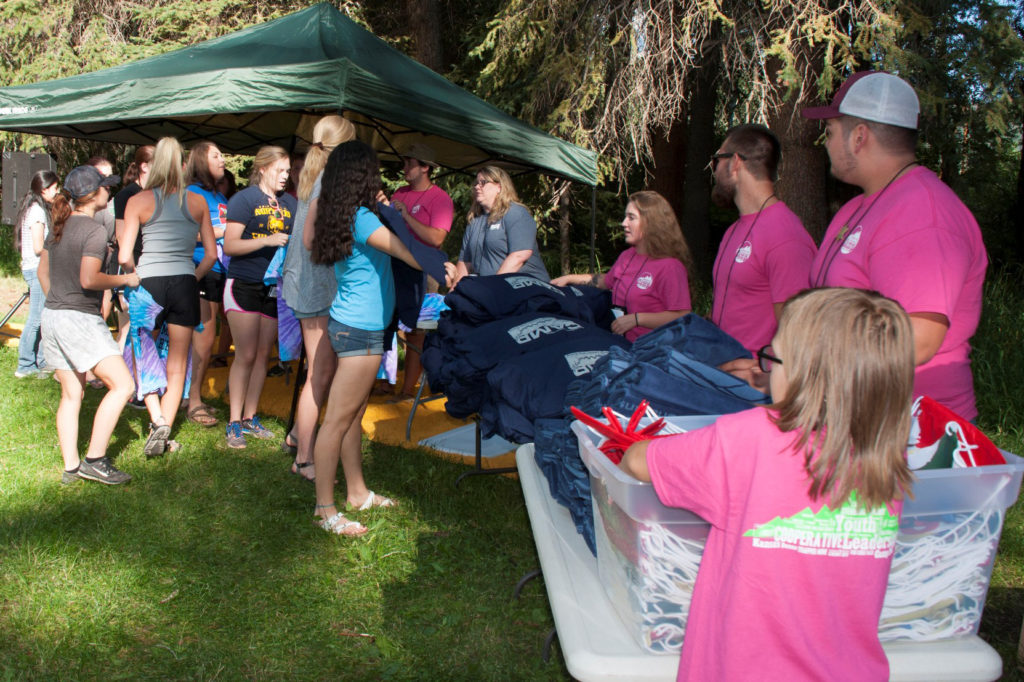 On the first day of camp, students line up to pay their $1 membership dues. (Photo By: Shana Read)