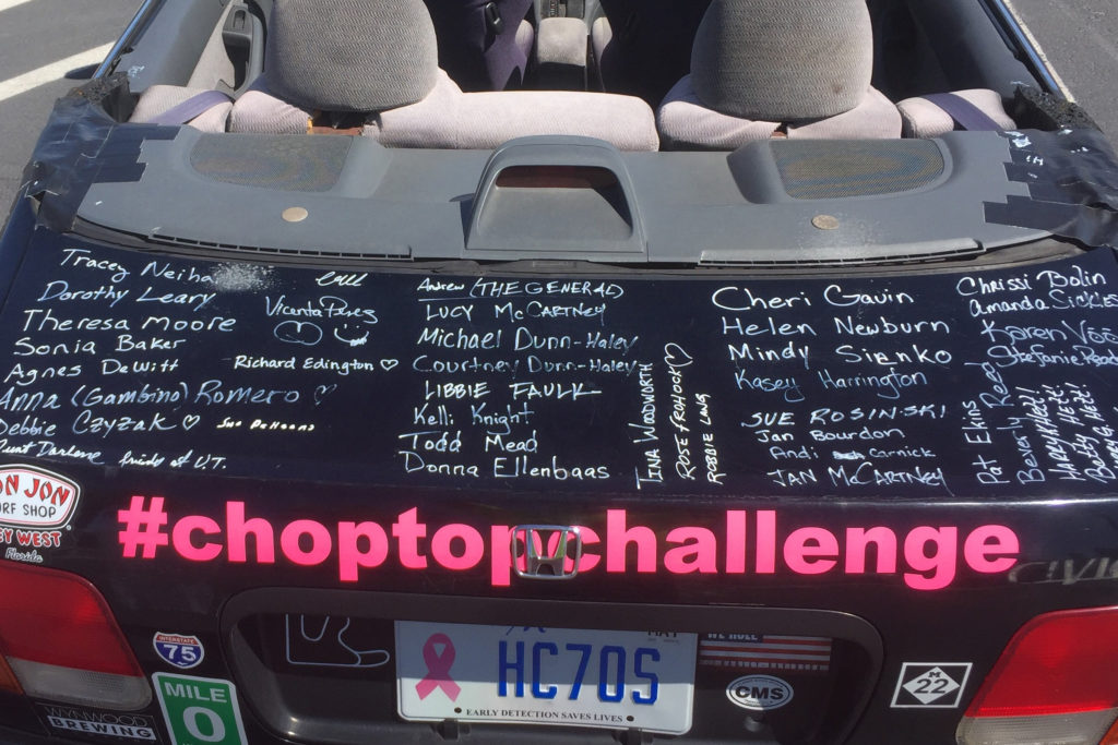 A close-up of Cherryland Electric Co-op’s Andy Hanna’s roofless, windshield-less—and autographed—1997 Honda Civic driven during the ChopTop Challenge, a four-day road race. (Photo Courtesy: Andy Hanna)