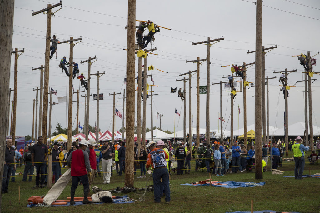 Lineworkers compete at the International Lineman's Rodeo in Bonner Springs, Kansas. (Photo by Denny Gainer)