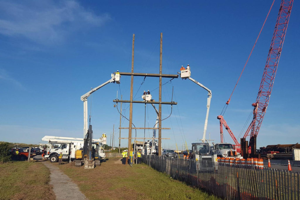 New overhead transmission curtailed a blackout for CHEC and TEMC caused by severed underground cables at the peak of summer tourism. (Photo By: CHEC) 