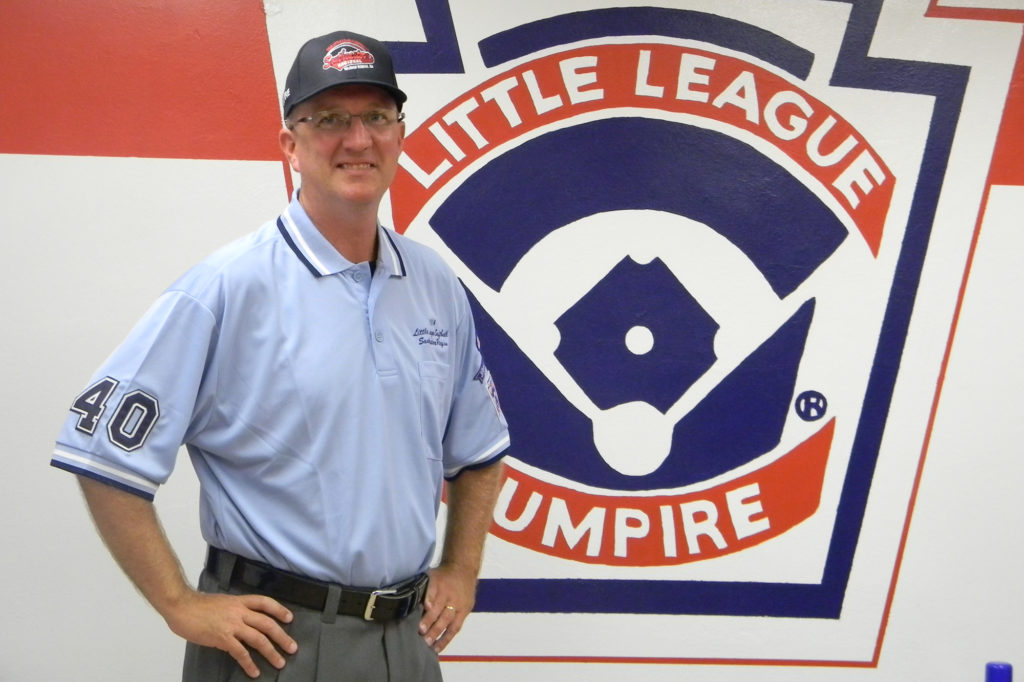 Brian Wolfe, a communications specialist for Rappahannock Electric Cooperative, has been chosen to be an umpire in the Little League Softball World Series. (Photo By: International Little League)