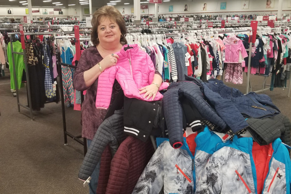 Laurens Electric Co-op's Kim Vaughn shops for winter coats for children using special "pay it forward" funds the co-op makes available for employees. (Photo By: Kent Vaughn)