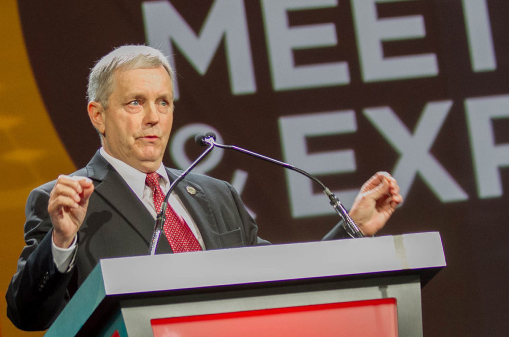 NRECA President Phil Carson tells the annual meeting that co-ops have a great opportunity at hand. (Photo By: Luis Gomez Photos)