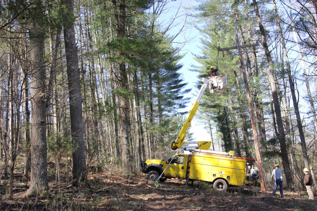 A Rappahannock Electric Cooperative crew repairs power lines after a wind storm moved through its Virginia service territory. (Photo By: Rappahannock EC)