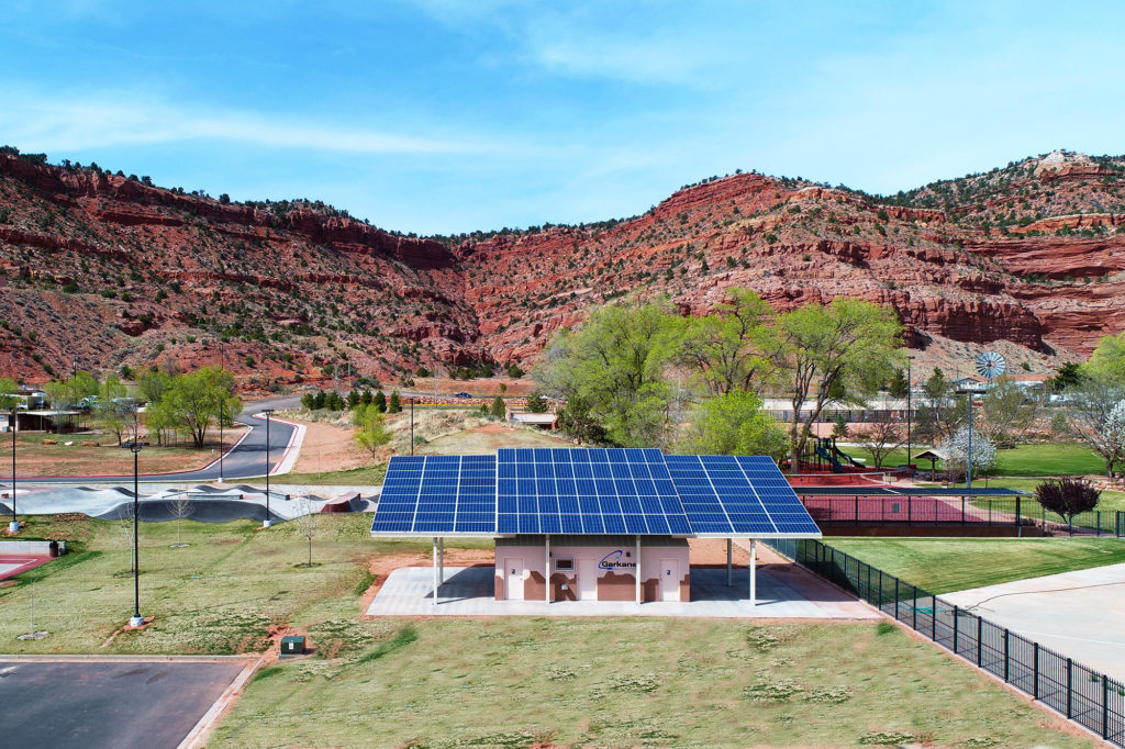 A Garkane Energy solar power array included the design of a performance pavilion at a city park in Kanab, Utah. It also improves acoustics for the audience. (Photo By: Neal Brown/ Garkane Energy)