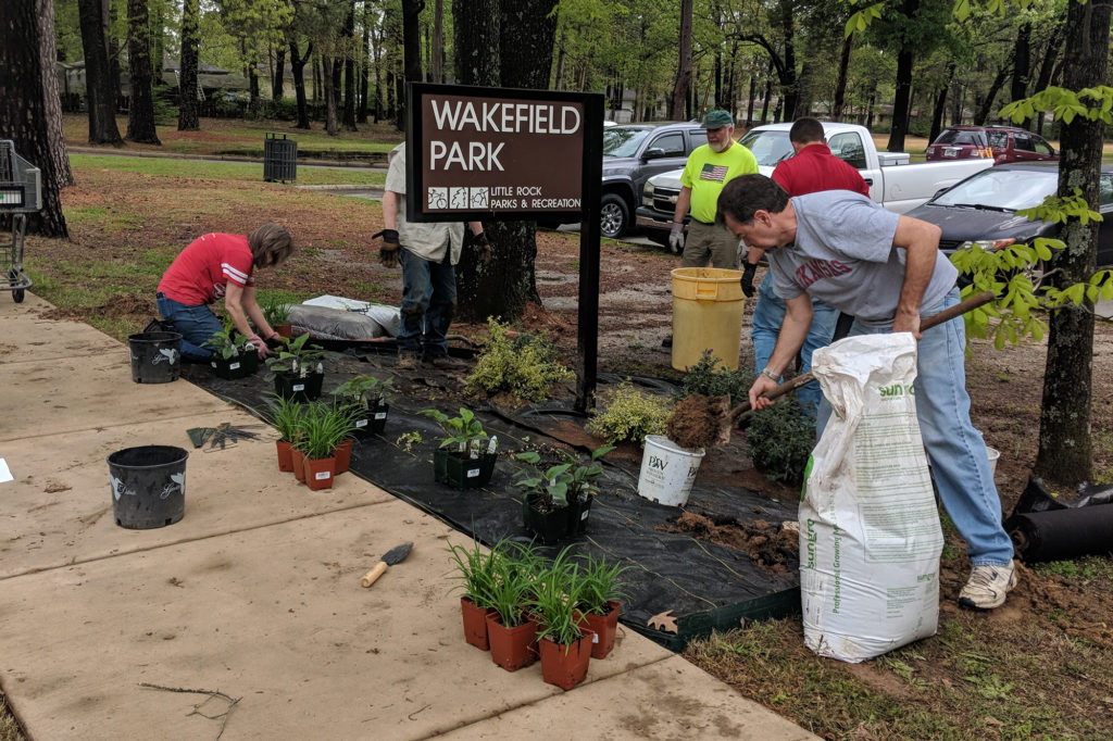 Co-op volunteers cultivate a pollinator garden with native plants attractive to butterflies at a city park near AECC headquarters. (Photo By: AECC)