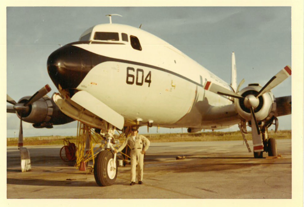 Jim Beeler, seen here in Guam with a U.S. Navy C-118 Liftmaster, served as a loadmaster during three tours of service in Southeast Asia. (Photo Courtesy of Jim Beeler)