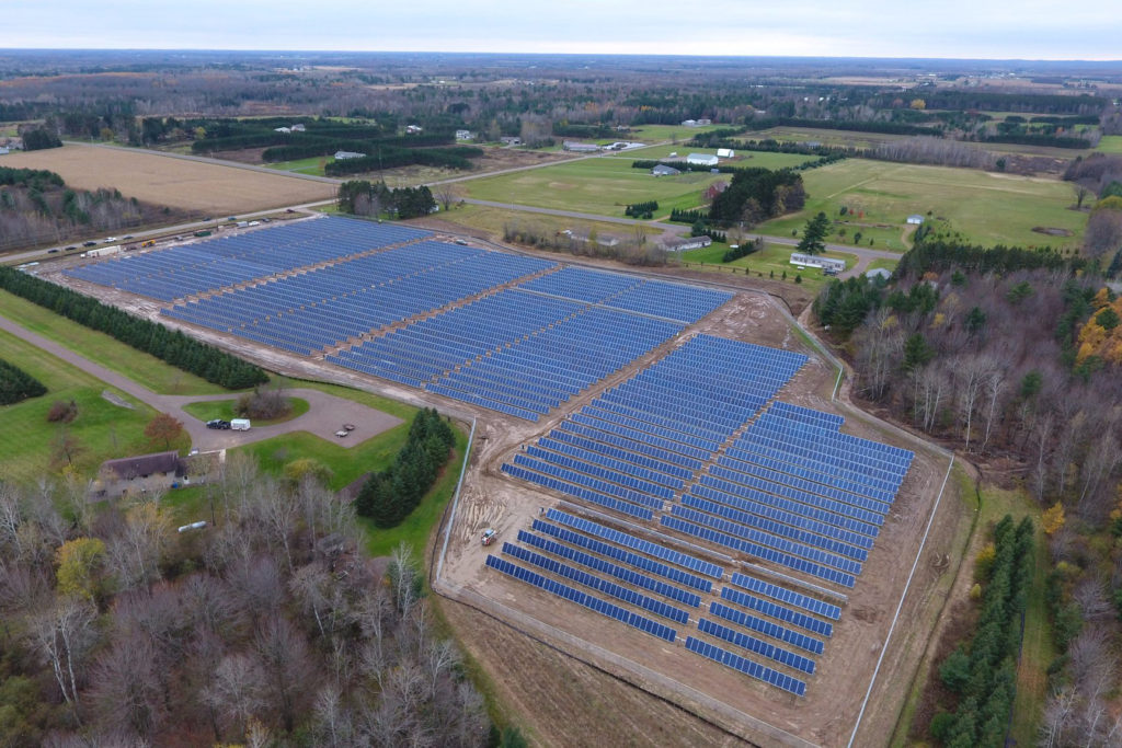 New research commissioned by NRECA and NRDC finds that community solar, like this Taylor Electric Co-op project in Medford, Wisconsin, offers greater savings and emission reductions than “zero net energy.” (Photo By: Taylor Electric Cooperative)