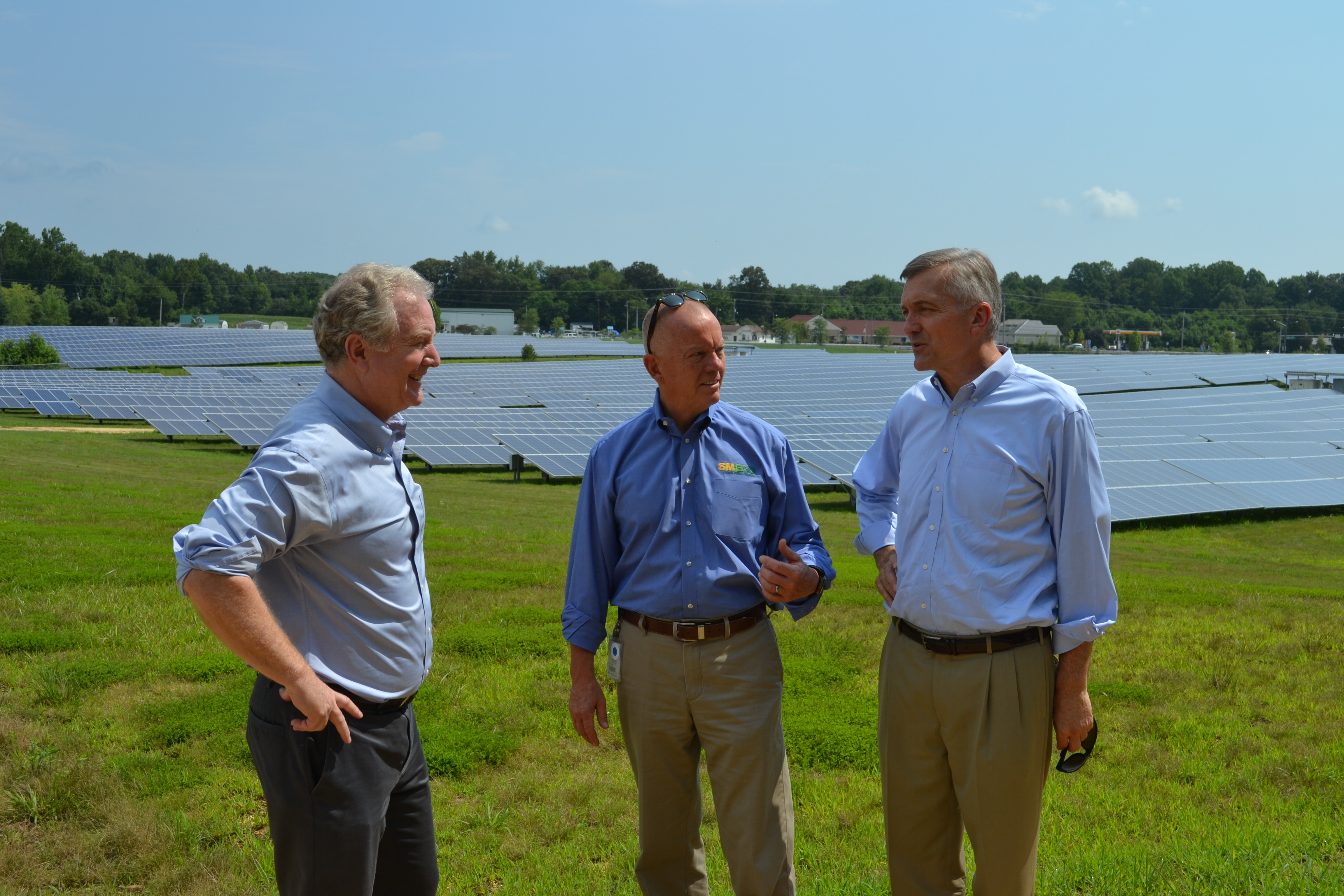 (L-R) U.S. Sen. Chris Van Hollen, SMECO President Joe Slater and NRECA CEO Jim Matheson tour the solar facility at the Hughesville, Maryland, co-op. (Photo By: John Johnston)