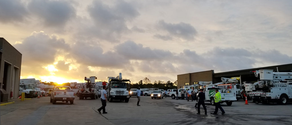 Crews prepare to head out for restoration work after pickup up poles and distribution system hardware from the Newport, North Carolina headquarters of Carteret-Craven Electric Cooperative. (Photo By: Lisa Galizia/Carteret Craven EC)