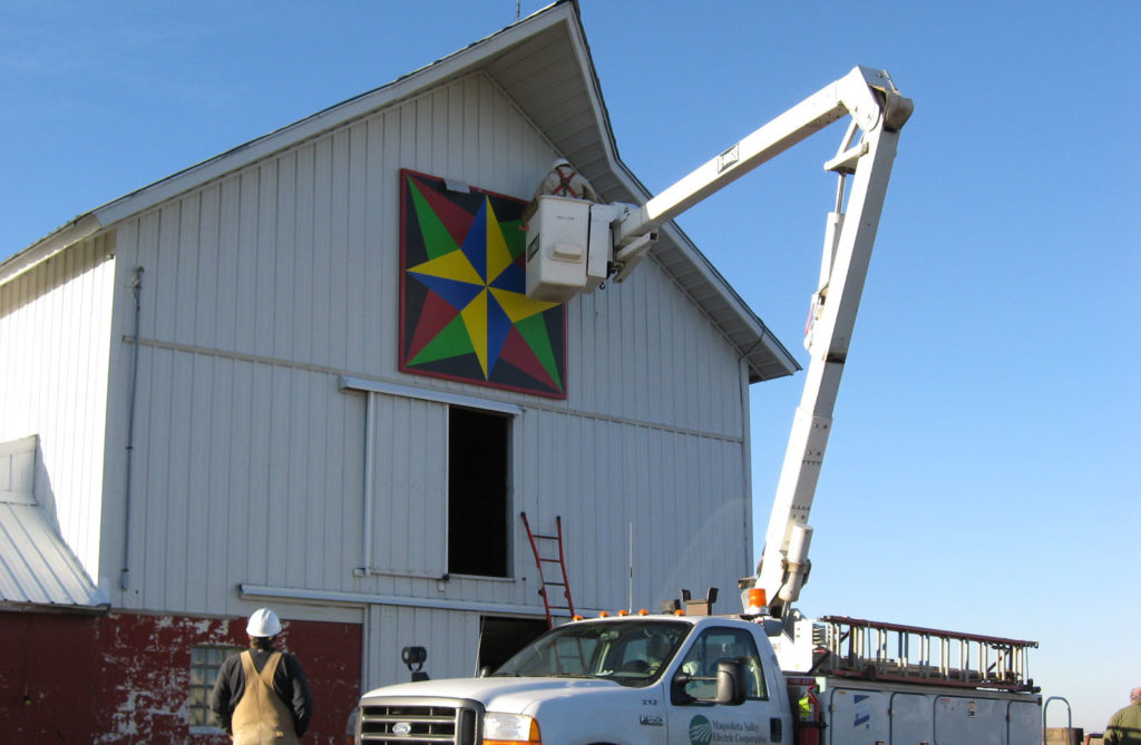 ”Blazing Star” is one of 12 barn quilts hung by crews of Maquoketa Valley Electric Co-op on a trail loop near its Anamosa, Iowa, headquarters. (Photo (Courtesy of MVEC)