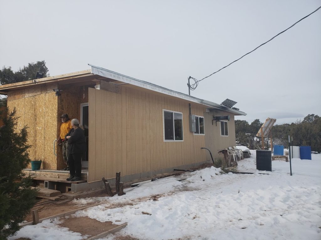 Geoff and Tina Wilson’s home in Talmage, Utah, now boasts a meter and a feeder line. Previously, a 100-kilowatt solar panel was the biggest source of power. (Photo By: Curtis Miles)