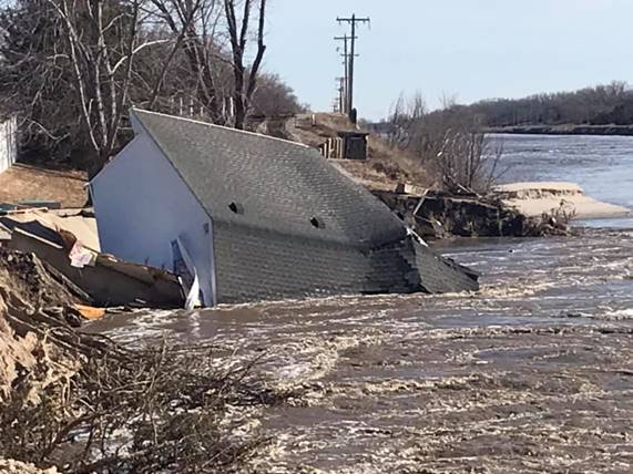 The caretaker’s house at Loup Power District’s hydroelectric plant and several other structures were washed away by flooding on the Loup River. (Photo By: Loup PPD) 