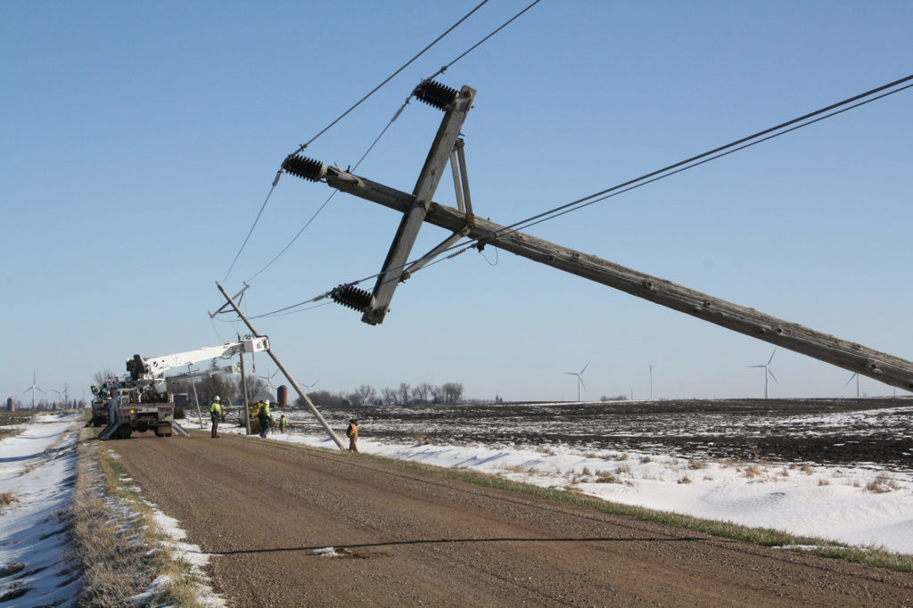 While crews will stabilize poles left leaning during power restoration, many that were damaged will need to be replaced later. (Photo By: Federated RE)