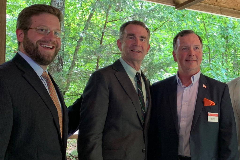 Virginia Gov. Ralph Northam (center) commends electric co-ops for pursuing broadband, which will help the state’s rural economy. Central Virginia Electric Cooperative CEO and President Gary Wood (right) accepted a nearly $672,000 grant to connect Fluvanna County. Evan Feinman (left) is the governor’s broadband adviser. (Photo By: Cathy Cash/NRECA)