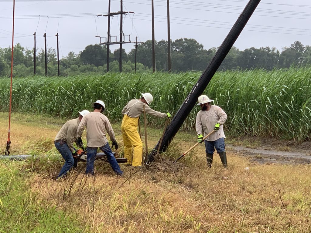 A SLEMCO crew works to replace a pole after Hurricane Barry made landfall near Intracoastal City, Louisiana, on July 13. (Photo By: Mary Laurent/ SLEMCO)