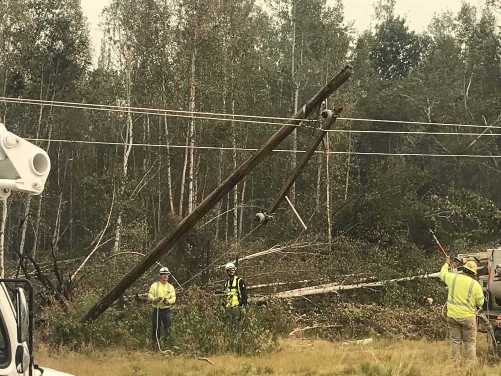 Crews from Matanuska Electric Association work inside of fire lines as firefighters battled the McKinley Wildfire near Palmer. (Photo By: Matanuska EA)