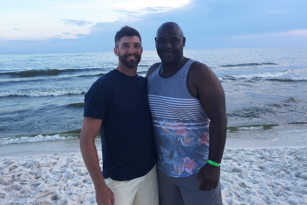 “We’re family now.” Coweta-Fayette EMC’s Dustin Arrington (l) and Steve Ellison meet shortly after the lineworker saved the firefighter’s life in Panama City Beach, Florida. (Photo Courtesy: Dustin Arrington)