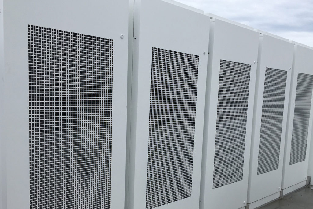 A microgrid in a Franklin County subdivision will include a 500 kW Tesla PowerPack battery system controlled by NCEMC, similar to the battery bank it operates at the Ocracoke microgrid pictured here. (Photo By: Cathy Cash/NRECA)