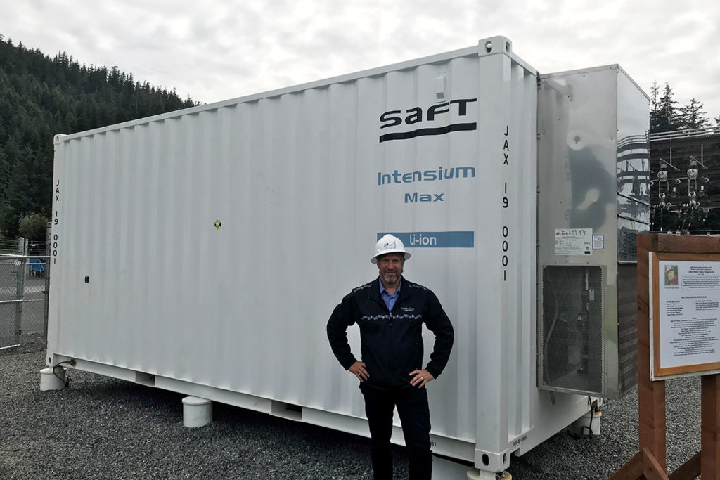 Cordova Electric Co-op CEO Clay Koplin stands by a new battery energy storage system that will support beneficial electrification in the remote Alaskan community along the south-central coast. (Photo By: Cordova Electric Co-op)