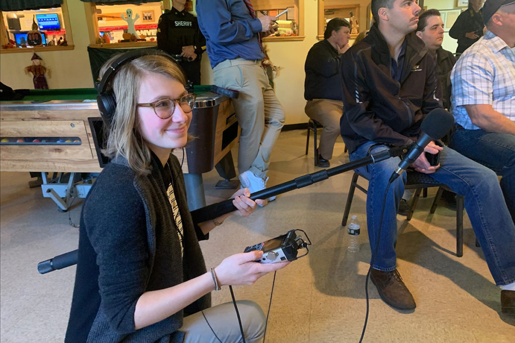 University of Vermont student Leah Kelleher tapes audio for the school’s Community News Service, a project supported by Vermont Electric Co-op.  (Photo Courtesy UVM/Community News Service)