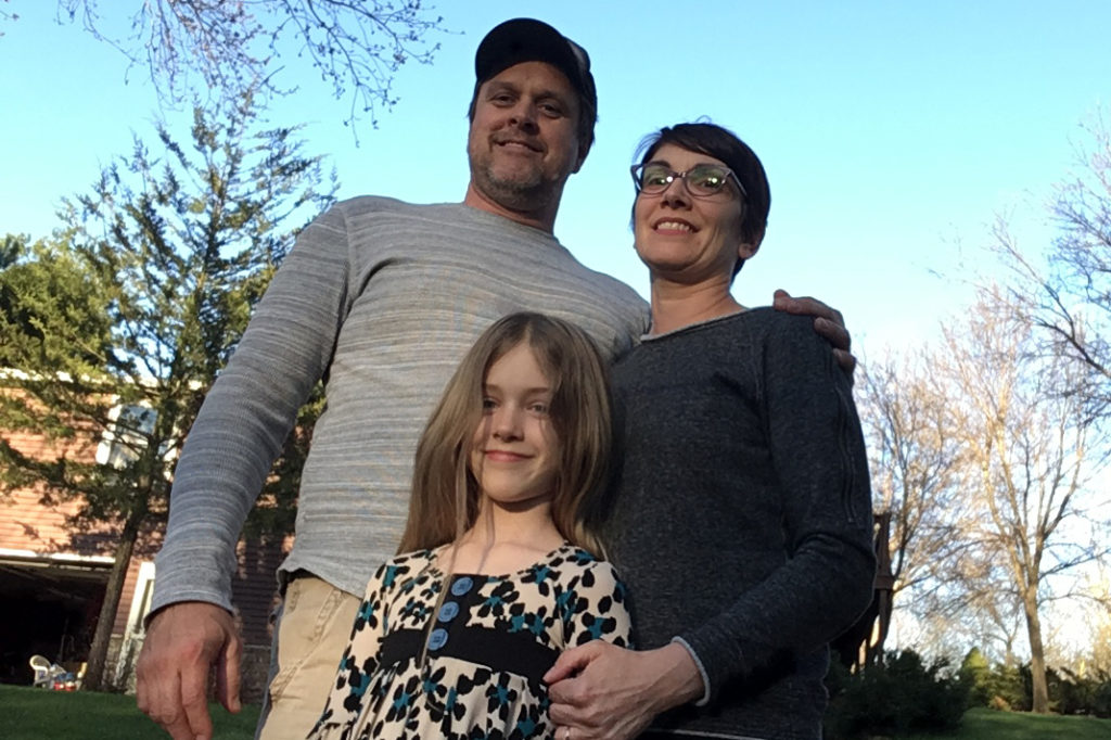 Dave and Heather Chavie and their daughter, Sophia, center, at the family’s home. (Photo By: David Chavie)