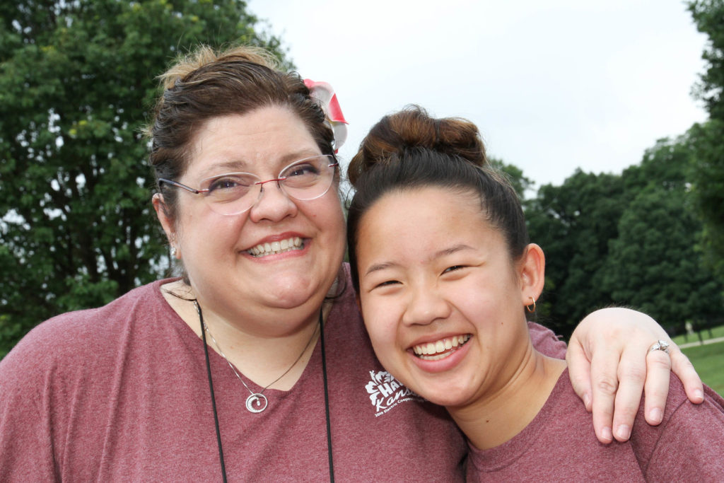 Kansas Electric Cooperatives’ Shana Read (l) with Youth Tour delegate Mia Rock at Arlington National Cemetery in 2019. (Photo Courtesy Shana Read)