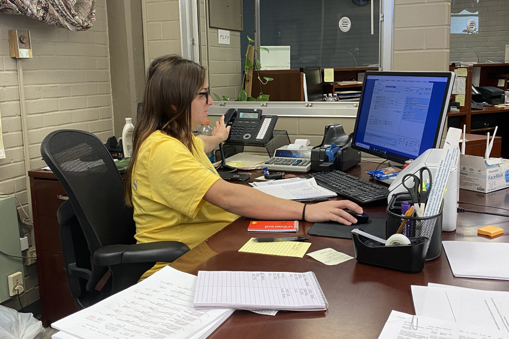 Jeff Davis Electric Cooperative’s Kaylie Romero keeps the channels of communication open amid post-Laura power restoration. (Photo By: Winnie Farris)