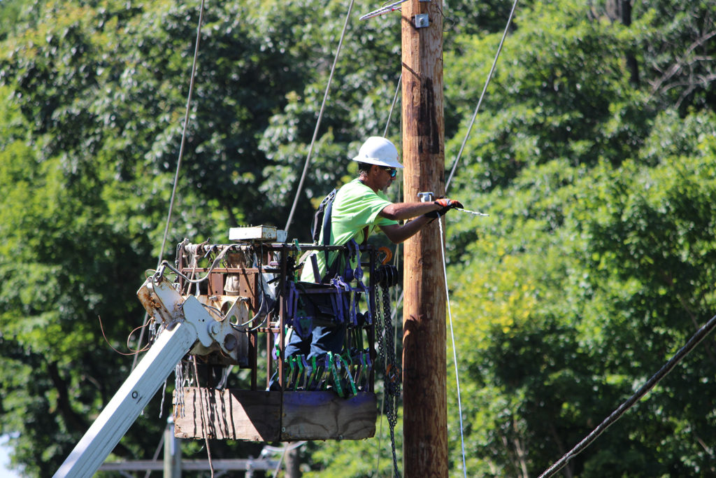 Wintek, Tipmont REMC’s broadband division, hangs fiber near Battle Ground, Indiana. The co-op received $16 million in state broadband grants for projects to connect more than 2,200 homes and businesses. (Photo Courtesy: Tipmont REMC)