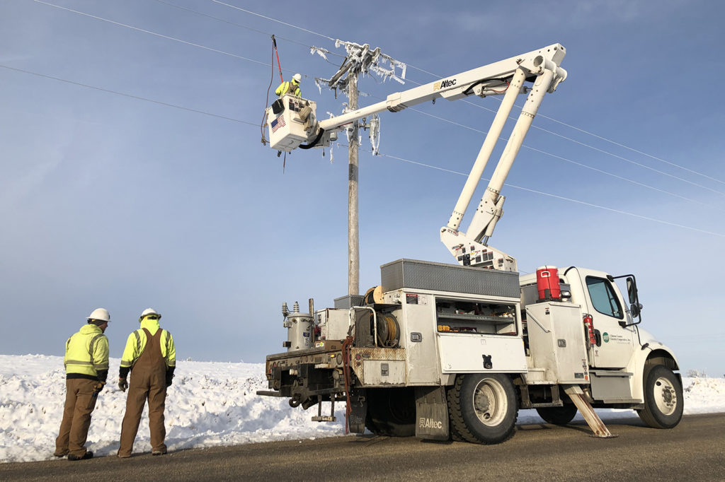 A crew from Breese, Illinois-based Clinton County EC works a mutual aid assignment in the service territory of Corn Belt Energy. (Photo By: Corn Belt Energy)