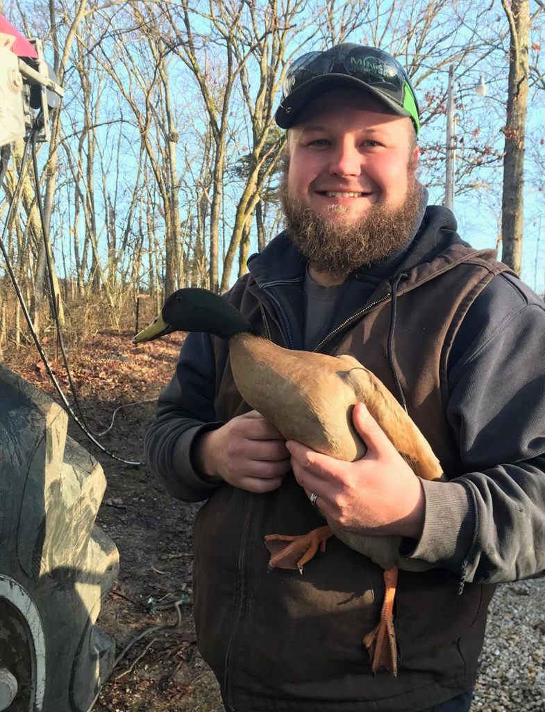 Rodney Etheridge relied on his experience with ducks on his family’s farm to help keep a Missouri co-op member’s mallard out of harm’s way.  (Photo By: AECC)
