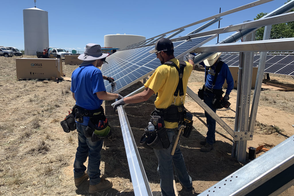 Technicians install a 148-kilowatt solar array at the Newdale-Grand Valley Water Cooperative. San Isabel Electric's Empower project will help offset water distribution costs in Otero County. (Photo By: SIEA) 